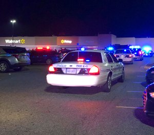 In this image from video Virginia police respond to the scene of a fatal shooting at a Walmart on Tuesday night, Nov. 22, 2022, in Chesapeake, Va.