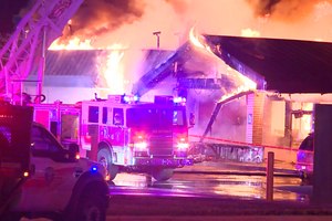 In this image taken from a video provided by KSAT-TV, flames rise from a Flying J Travel Center near Interstate 10 in San Antonio on Thursday morning. The truck stop was destroyed.