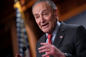 Senate Majority Leader Chuck Schumer, D-N.Y., speaks with reporters after Democratic Sen. Raphael Warnock defeated Republican challenger Herschel Walker in a runoff election on Dec. 7.