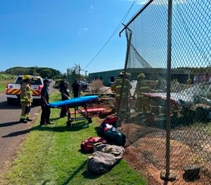 Emergency personnel work at the scene of a plane crash in Lihue, Hawaii on Thursday, Dec. 15, 2022.