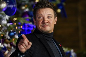 Jeremy Renner poses for photographers upon arrival at a 2021 UK screening of 