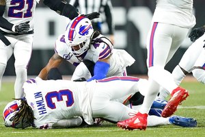 Buffalo Bills safety Damar Hamlin went into cardiac arrest Monday night after tackling Bengals wide receiver Tee Higgins.