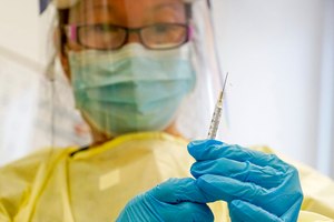 A physician assistant prepares a syringe with the Mpox vaccine for a patient at a vaccination clinic in New York on Aug. 19, 2022.