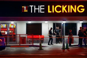 A large crowd had gathered outside the restaurant at the time of the shooting, Miami Gardens police spokesperson Diana Gourgue said.
