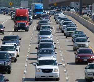 Drivers work their way out of Dallas during rush hour, July 1, 2016. The number of traffic deaths on U.S. roadways fell slightly during the first nine months of 2022, but pedestrian and cyclist deaths continue to rise.