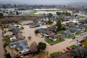Flooding from huge amounts of rain is seen in a neighborhood near Watsonville, Calif. on Monday.