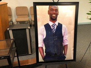 A portrait of Tyre Nichols was displayed at a memorial service for him on Jan. 17 in Memphis, Tenn.