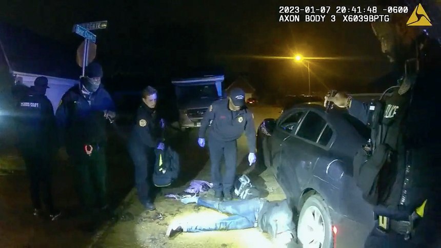 The image from video released on Jan. 27, 2023, by the City of Memphis, shows Tyre Nichols on the ground as EMS personnel arrive on scene on Jan. 7, 2023.