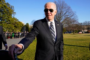 President Joe Biden talks with reporters on the South Lawn of the White House on Monday. His administration previously considered ending the emergency last year but held off amid concerns about a potential winter surge in cases and to provide adequate time for providers, insurers and patients to prepare for the changes.