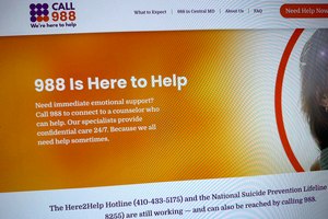 Part of the 988helpline.org website was photographed Friday. A cyberattack caused a nearly daylong outage of the nation's new 988 mental health helpline on Dec. 1.