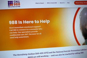 Part of the 988helpline.org website was photographed Friday. A cyberattack caused a nearly daylong outage of the nation's new 988 mental health helpline on Dec. 1.