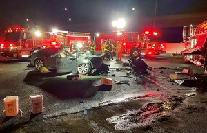 Contra Costa County firefighters worked the scene of a fatal accident involving a Tesla and a fire truck early Saturday morning.