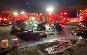 Contra Costa County firefighters worked the scene of a fatal accident involving a Tesla and a fire truck early Saturday morning.