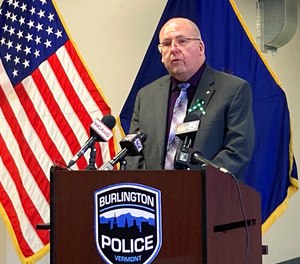 Tom Curran, brother of 1971 murder victim Rita Curran, faces reporters during a news conference.