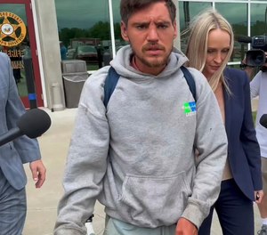 Randal Worcester walks out of the Crawford County Justice Center in Van Buren, Ark., on Aug. 22, 2022.