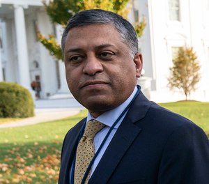 Dr. Rahul Gupta, the director of the White House Office of National Drug Control Policy, walks at the White House.
