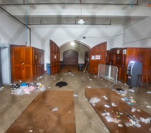 Debris is seen in the main entrance of Main Street Armory on Monday, March 6, 2023, in Rochester, N.Y following a stampede that left one dead and several injured.