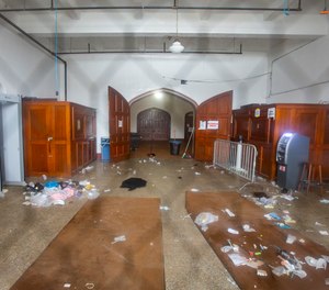 Debris is seen in the main entrance of Main Street Armory on Monday, March 6, 2023, in Rochester, N.Y following a stampede that left one dead and several injured.