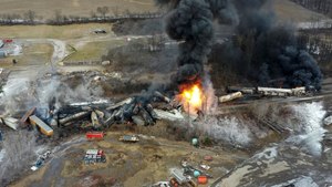 This photo taken with a drone shows portions of a Norfolk Southern freight train that derailed Feb. 3 in East Palestine, Ohio. A fire was burning at midday Feb. 4.