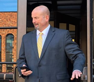 Willie Hedden, a former Illinois correctional officer, leaves the U.S. District Court building.