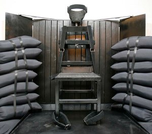 A chair sits in the execution chamber at the Utah State Prison on June 18, 2010, after Ronnie Lee Gardner was executed by firing squad in Draper, Utah. Idaho lawmakers passed a bill on March 20, 2023, that would authorize the use of firing squads if the state is unable to obtain drugs required for its lethal injection program. The bill will head to the desk of Idaho Gov. Brad Little next.