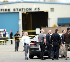 Police investigate a shooting near Mahany Park in Roseville, Calif., Thursday, April 6, 2023.