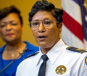 New Orleans Police Capt. Michelle Woodfork speaks as the new interim police superintendent during a press conference at New Orleans City Hall on Dec. 20, 2022.