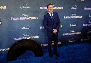 Jeremy Renner, the host and executive producer of "Rennervations," poses at the premiere of the four-part Disney+ docuseries on April 11 in Los Angeles. The premiere marked Renner's first public, in-person appearance since a Jan. 1 snow plow accident.