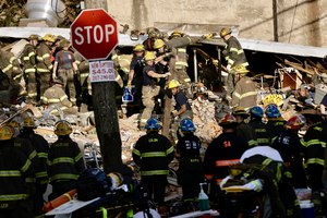 Philadelphia firefighters worked to rescue colleagues trapped in a rowhouse collapse on the 300 block of West Indiana on Saturday, June 18, 2022.