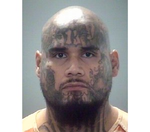 This undated photo released by the Pasco County, Fla., Sheriff's Office shows Oscar Solis Jr.