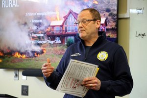 Firefighter Jason Kohler leads a class on fighting wildfires on April 24 in Anchorage, Alaska.