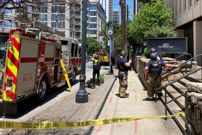 Crews were on scene Wednesday as police officers searched for a gunman.