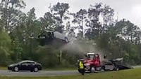 Video: Car goes airborne at Ga. crash scene