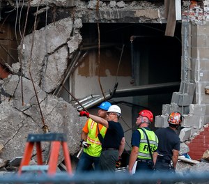 Crews continue to work at the site of The Davenport, one week after the building partially collapsed, Sunday, June 4, 2023, in Davenport, Iowa.