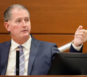 Coral Springs Police Sgt. Jeffrey Heinrich points to the defendant as he testifies during the trial of former Marjory Stoneman Douglas High School School Resource Officer Scot Peterson.