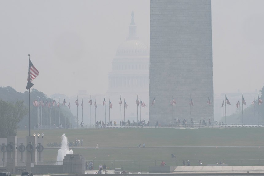 The National Mall is hazy with smoke from wildfires in Canada obscuring the view of the Capitol almost completely past the Washington Monument, as seen from the Lincoln Memorial plaza, Thursday, June 29, 2023, in Washington.