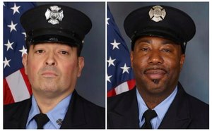 Newark firefighters Augusto Acabou, left, and Wayne Brooks Jr.