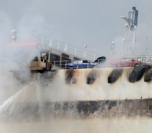 Emergency personnel battle against a fire aboard the Italian-flagged Grande Costa d'Avorio cargo ship at the Port of Newark, Friday, July 7, 2023, in Newark, N.J.