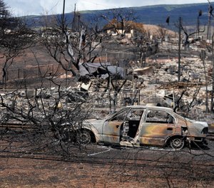 Destroyed property is seen in Lahaina, Hawaii, following a deadly wildfire.