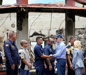 President Joe Biden and first lady Jill Biden greet first responders as they visit areas devastated by the Maui wildfires, Monday, Aug. 21, 2023, in Lahaina, Hawaii.