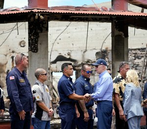 President Joe Biden and first lady Jill Biden greet first responders as they visit areas devastated by the Maui wildfires, Monday, Aug. 21, 2023, in Lahaina, Hawaii.