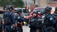 SWAT team frees correctional officer held hostage by inmates at St. Louis jail