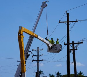 Hawaii’s electric utility acknowledged its power lines started a wildfire on Maui but faulted county firefighters for declaring the blaze contained and leaving the scene, only to have a second wildfire break out.