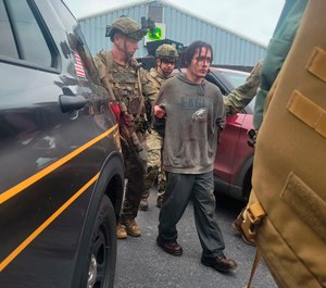 Danelo Souza Cavalcante is taken into custody after a two-week search for the convicted murderer.