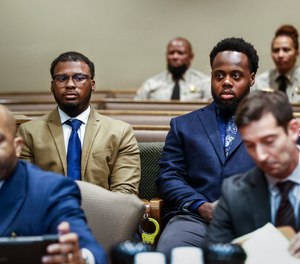 Former Memphis police officers Justin Smith, center left, and Tadarrius Bean, center right, appear in Judge James Jones Jr.'s courtroom involving the case of five Memphis police officers charged with fatally beating Tyre Nichols, Friday, Sept. 15, 2023, in Memphis, Tenn.