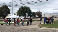 Vehicle strikes 5 workers picketing in UAW strike outside Mich. plant