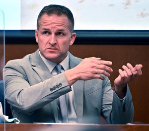 Former Louisville Police officer Brett Hankison talks about seeing a subject in a firing stance in the apartment as he is cross-examined in Louisville, Ky. on March 2, 2022.
