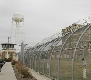 In this Feb. 15, 2006 file photograph, guard tower one overlooks the back side of the Lansing Correctional Facility in Lansing, Kan.