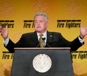 International Association of Fire Fighters President Harold A. Schaitberger speaks at the IAFF Legislative Conference and Presidential Forum in 2015. The IAFF has concluded its internal investigation into allegations of financial misconduct by Schaitberger, stating Schaitberger was not at fault for any alleged pension overpayments.