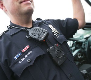 Sgt. Chris Wicklund of the Burnsville Police Department wears a body camera beneath his microphone.
